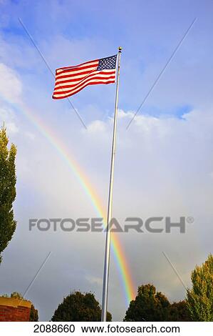 Stock Image - Rainbow Over The American Flag; Portland Oregon United States Of America. Fotosearch