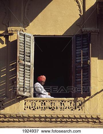 Stock Photo - Rajasthani Man Watches Passers By. Fotosearch