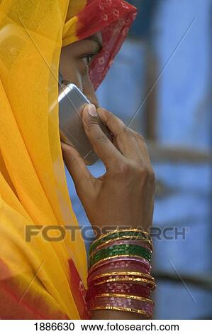 Rajasthani Woman With Mobile Phone View Large Photo Image Stock Image - Rajasthani Woman With Mobile Phone. Fotosearch