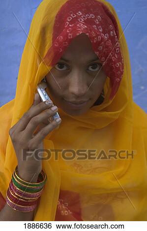 Stock Photograph - Rajasthani Woman With Mobile Phone. Fotosearch