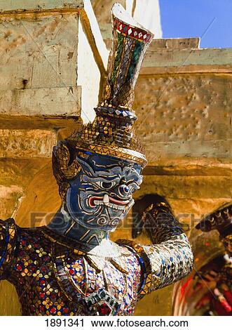 Stock Image - Ramakien Figure At Wat Phra Kaeo. Fotosearch