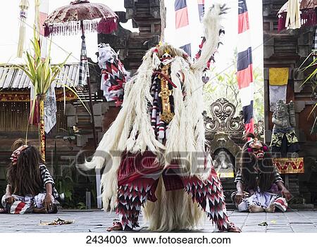 Stock Image - Rangda, a mythological creature in a Barong dance performance in Batubulan, Bali, Indonesia. Fotosearch