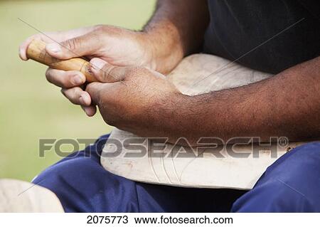 Stock Image - Rapa Nui Carver In Hanga Roa, Rapa Nui (Easter Island), Chile. Fotosearch