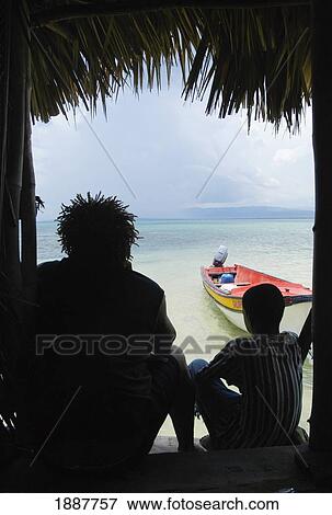 Rasta And Young Boy Sitting In Doorway Of Bar Out At Sea View Large Photo Image Stock Photo - Rasta And Young Boy Sitting In Doorway Of Bar Out At Sea. Fotosearch