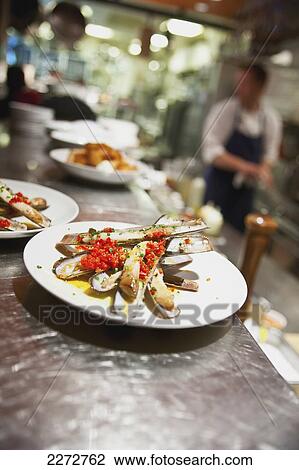 Razor clams on a plate in a restaurant; boston massachusetts usa View Large Photo Image Stock Image - Razor clams on a plate in a restaurant; boston massachusetts usa. Fotosearch