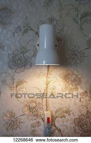 Reading light in a hotel room; Odessa, Ukraine View Large Photo Image Stock Photograph - Reading light in a hotel room; Odessa, Ukraine. Fotosearch