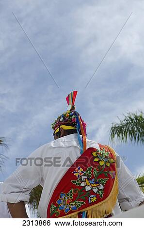 Stock Photograph - Rear view of man wearing traditional outfit; Puerta Vallarta, Jalisco, Mexico. Fotosearch