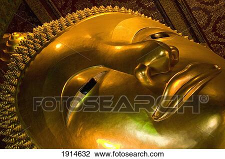 Stock Image - Reclining Buddha Statue In Wat Pho. Fotosearch