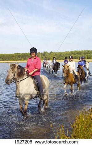 Stock Photo - Recreational Horseback Riding. Fotosearch