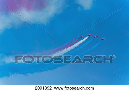 Stock Image - Red Arrows In Action At The Eastbourne Airshow, East Sussex, Uk. Fotosearch