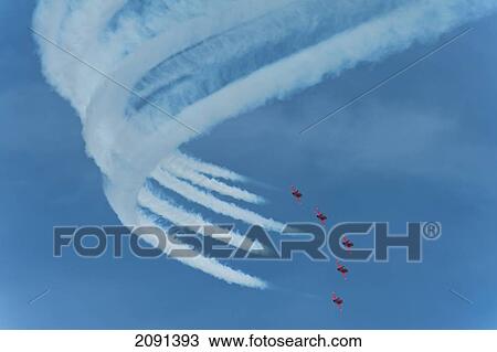 Red Arrows In Action At The Eastbourne Airshow, East Sussex, Uk View Large Photo Image Stock Image - Red Arrows In Action At The Eastbourne Airshow, East Sussex, Uk. Fotosearch