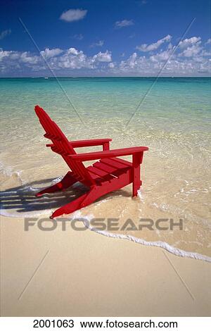 Red Beach Chair Along Shoreline Turquoise Ocean Calm Stock Image