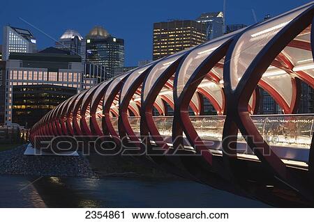 Red Bridge At Night With Lights And City Buildings In The Background; Calgary, Alberta, Canada View Large Photo Image Stock Image - Red Bridge At Night With Lights And City Buildings In The Background; Calgary, Alberta, Canada. Fotosearch