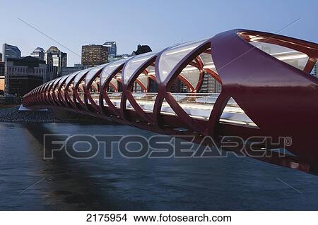 Picture - Red Bridge Over The Bow River At Twilight With Lights; Calgary Alberta Canada. Fotosearch