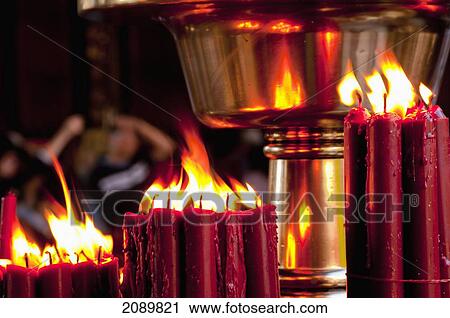 Stock Image - Red Candles Burning At Longshan Temple Taipei, Taiwan, Asia. Fotosearch