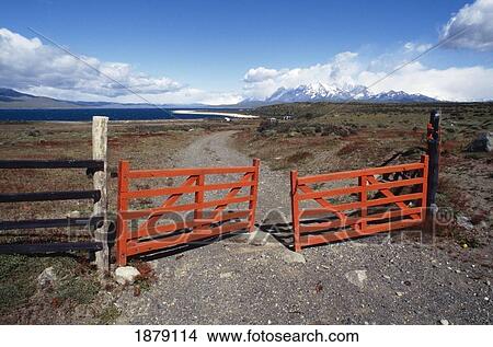 Red Gate Over Dirt Road View Large Photo Image Picture - Red Gate Over Dirt Road. Fotosearch