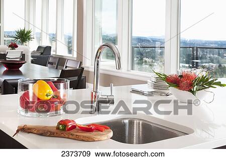 Red Peppers In Kitchen With Water View; Langford, Vancouver Island, British Columbia, Canada View Large Photo Image Stock Photo - Red Peppers In Kitchen With Water View; Langford, Vancouver Island, British Columbia, Canada. Fotosearch