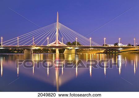 Stock Image - Red River And Esplanade Riel Bridge At Night, Winnipeg, Manitoba. Fotosearch