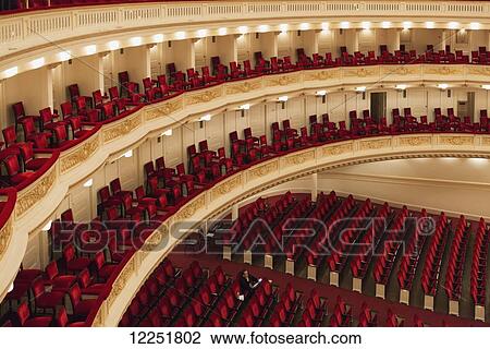 Stock Image - Red theatre seating; New York City, New York, United States of America. Fotosearch