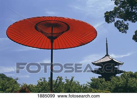 Red Umbrella With Temple Beyond, Close Up View Large Photo Image Stock Photo - Red Umbrella With Temple Beyond, Close Up. Fotosearch