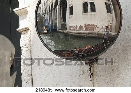 Reflection In A Mirror Of Tourists In A Boat On Venice Canal, Veneto Region, Italy View Large Photo Image Stock Photography - Reflection In A Mirror Of Tourists In A Boat On Venice Canal, Veneto Region, Italy. Fotosearch