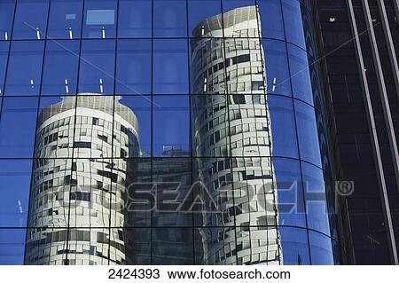 Reflection of a residential building in windows of an office tower; Paris, France View Large Photo Image Stock Image - Reflection of a residential building in windows of an office tower; Paris, France. Fotosearch