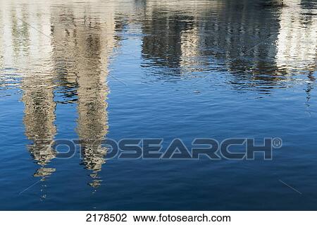 Stock Image - Reflection Of Buildings In The Water; Zurich Switzerland. Fotosearch