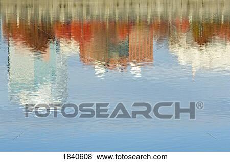 Stock Photo - Reflection Of Buildings In Willamette River; Portland, Oregon, Usa. Fotosearch