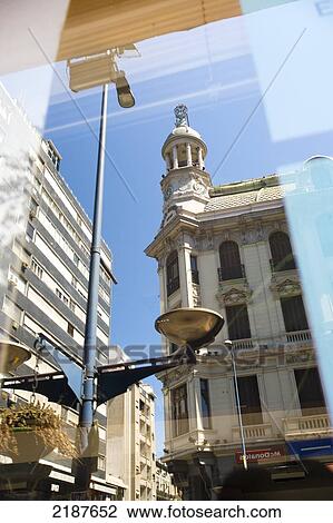 Stock Image - Reflection Of London Paris Building, Built In 1908, Historical Eclecticism Style, Montevideo, Uruguay, South America. Fotosearch