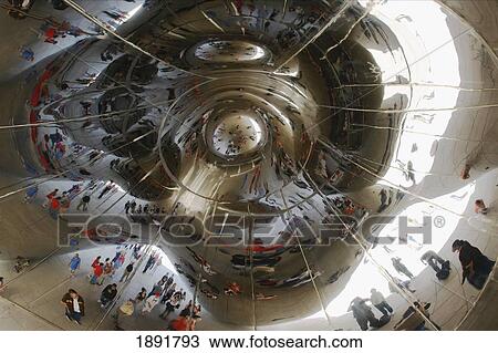 Stock Image - Reflection Of People In 'cloud Gate' (The Bean) Sculpture At Sbc Plaza. Fotosearch
