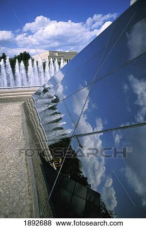 Stock Photo - Reflections In Glass Pyramid. Fotosearch