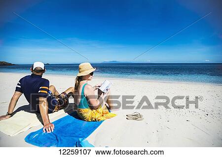 Stock Photo - Relaxing on one of Timor-Leste's Northen beaches; Timor-Leste. Fotosearch
