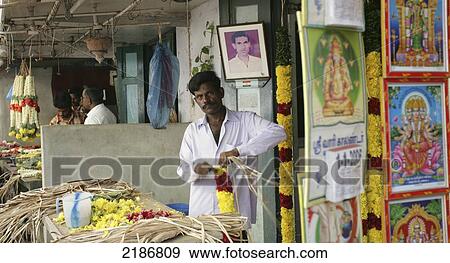 Stock Photo - Religious artwork for sale at Kapaleeshwara Temple; Chennai, Tamil Nadu, India. Fotosearch