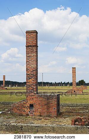 Stock Image - Remains of prisoner blocks in Birkenau death camp; Osweciem, Poland. Fotosearch
