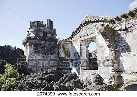 Stock Photo - Remains Of The San Juan Parangaricutiro Church Destroyed By The Paricut. Fotosearch