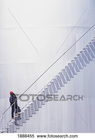 Repairman Climbing Stairs View Large Photo Image Stock Photography - Repairman Climbing Stairs. Fotosearch
