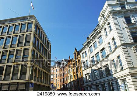 Residential and office buildings under a blue sky; Hamburg, Germany View Large Photo Image Stock Image - Residential and office buildings under a blue sky; Hamburg, Germany. Fotosearch