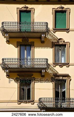 Stock Photograph - Residential building with small balconies; Lugano, Switzerland. Fotosearch