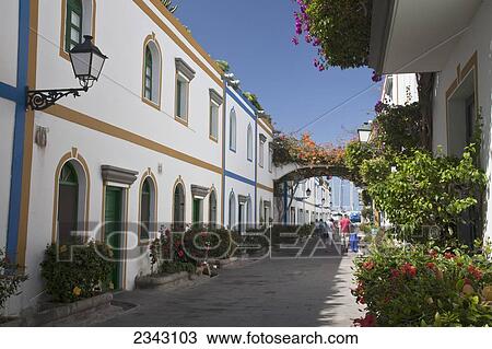 Residential Buildings Along A Street; Puerto Morgan, Gran Canaria, Spain View Large Photo Image Stock Image - Residential Buildings Along A Street; Puerto Morgan, Gran Canaria, Spain. Fotosearch