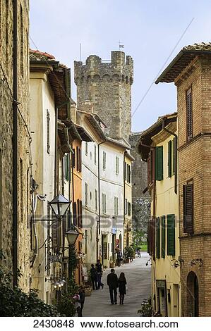 Stock Photo - Residential buildings and a historic watchtower; Montalcino, Tuscany, Italy. Fotosearch
