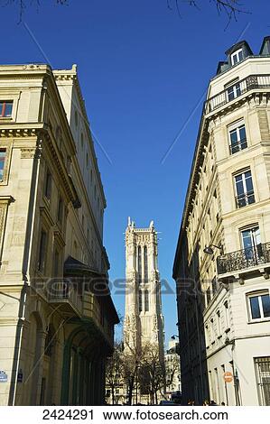 Residential buildings and a tower in Marais district; Paris, France View Large Photo Image Stock Image - Residential buildings and a tower in Marais district; Paris, France. Fotosearch