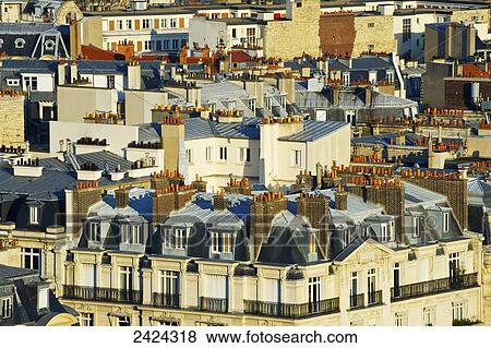 Stock Photo - Residential buildings and chimneys on the rooftops; Paris, France. Fotosearch
