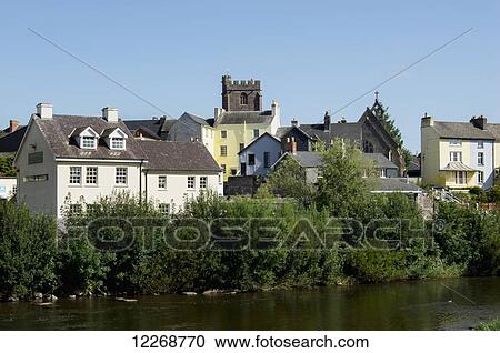 Residential buildings and church with trees along a river; Brecon, Powys, Wales View Large Photo Image Stock Image - Residential buildings and church with trees along a river; Brecon, Powys, Wales. Fotosearch