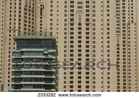 Stock Image - Residential High-Rise Buildings In Dubai Marina; Dubai, United Arab Emirates. Fotosearch