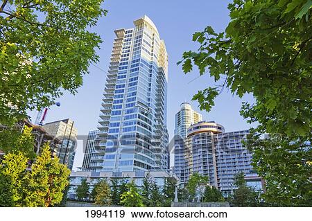 Stock Photo - Residential Skycraper In Coal Harbor, Vancouver, British Columbia, Canada. Fotosearch
