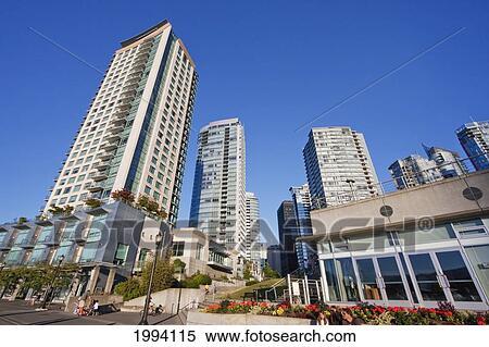 Stock Photography - Residential Skyscrapers Along Coal Harbor Quay, Vancouver, British Columbia, Canada. Fotosearch