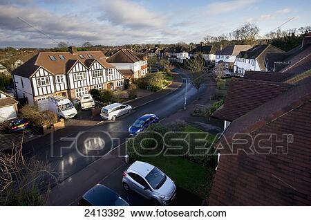 Stock Image - Residential street; Surrey, England. Fotosearch