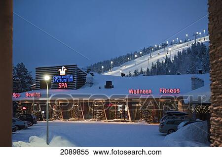 Stock Photography - Resort In Front Of The Floodlit Ski Slope, Levi, Lapland, Finland. Fotosearch