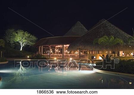Stock Photograph - Resort Pool At Night; Costa Rica. Fotosearch