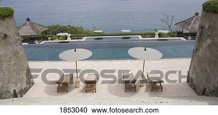 Resort With Pool, Candi Dasa, Bali, Indonesia View Large Photo Image Stock Image - Resort With Pool, Candi Dasa, Bali, Indonesia. Fotosearch